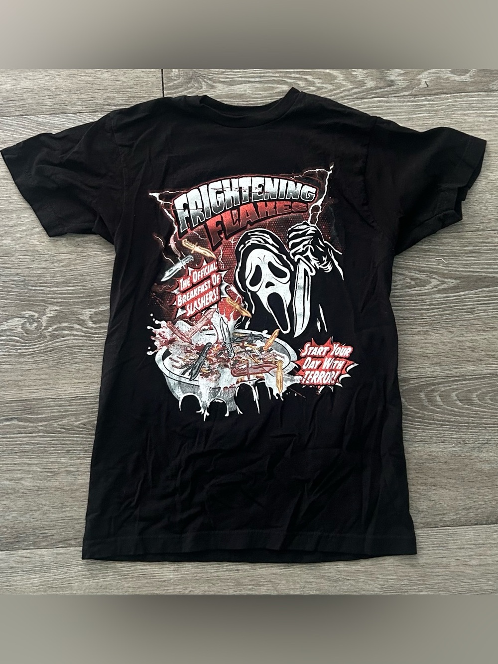 Spencer's Black Women's Short Sleeve 'Frightening Flakes' Graphic Tee